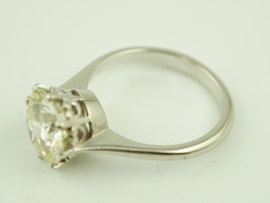A platinum and solitaire diamond set ring